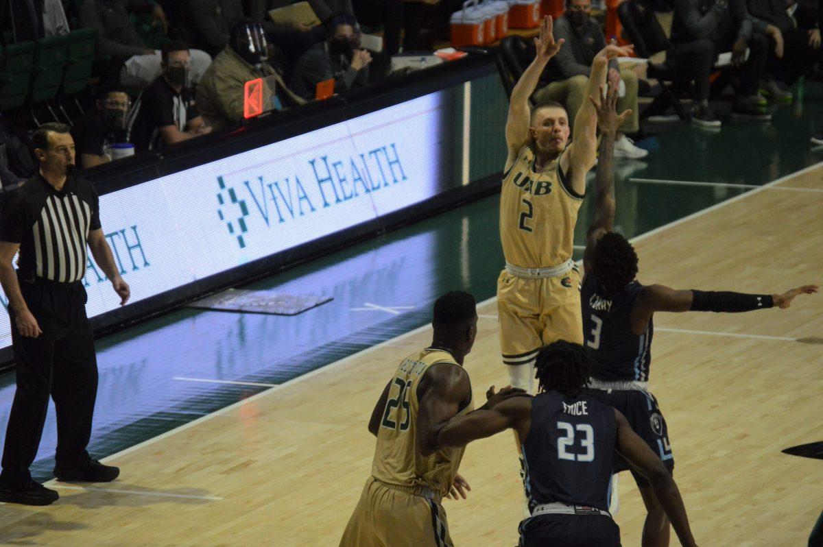 Michael Ertel shoots against Old Dominion | Caleb Wood