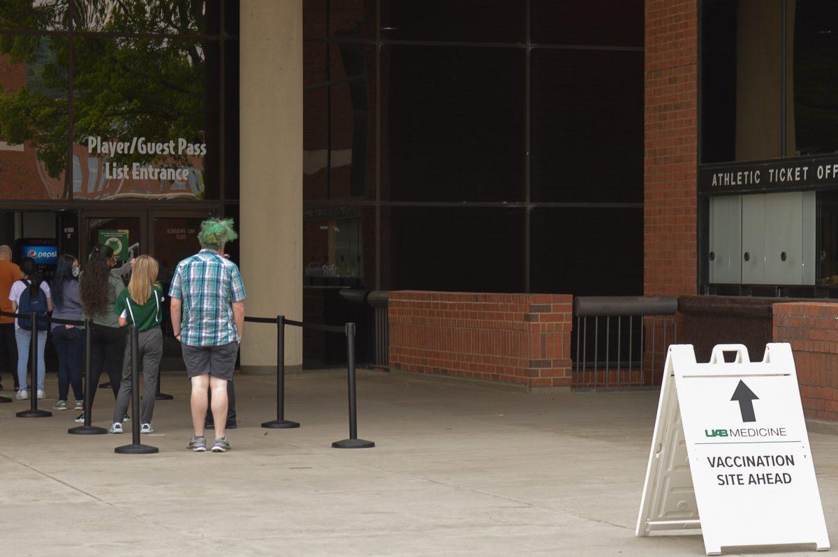 People line up outside Bartow Arena for the COVID-19 vaccine. | Photo by Caleb Wood