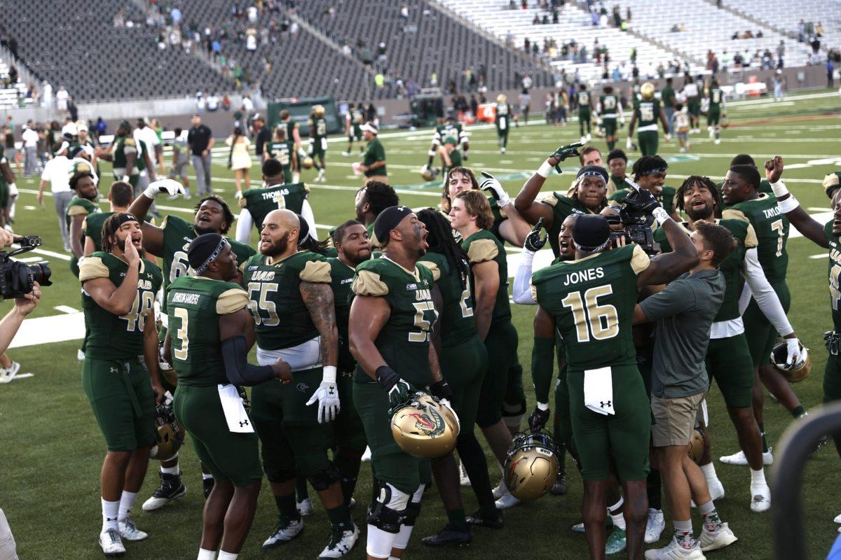 The UAB football team celebrates their win over FAU | Photo by Dawson Martin