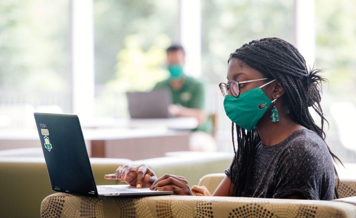 A student studies masked. UAB has moved to a mask optional environment | Courtesy UAB Image Galley